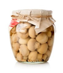 marinated-mushrooms-in-a-glass-jar-isolated-on-white_219717-548
